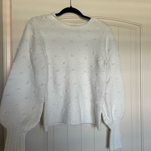 White, cozy, Rachel parcel sweater.